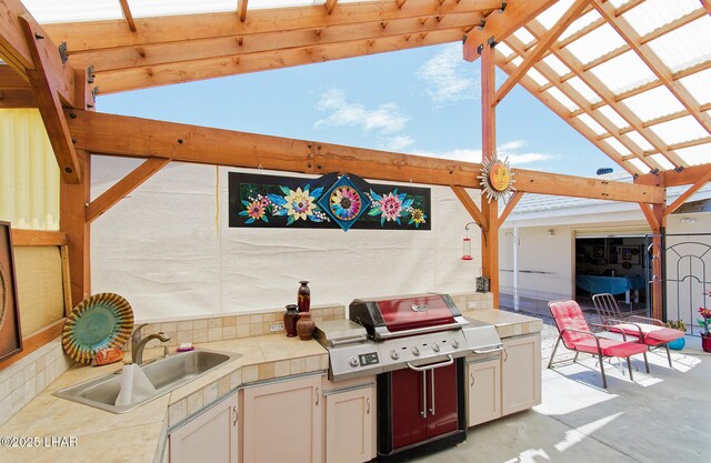 49605 Felspar Ave, Quartzsite, AZ 85346 - view of patio featuring exterior kitchen and a pergola