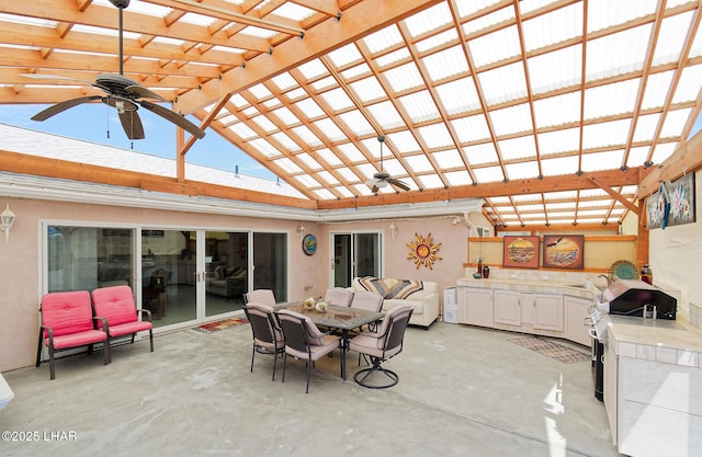 49605 Felspar Ave, Quartzsite, AZ 85346 - view of patio / terrace with a ceiling fan, an outdoor kitchen, and a pergola