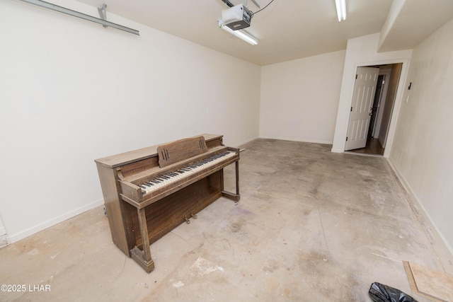 31447 Marine Dr, Parker, AZ 85344 - garage featuring a garage door opener and baseboards