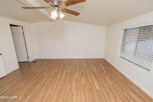 31447 Marine Dr, Parker, AZ 85344 - empty room featuring light wood finished floors, ceiling fan, and baseboards