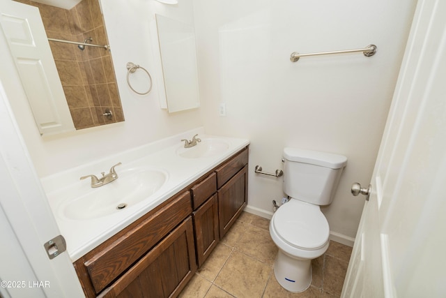 31447 Marine Dr, Parker, AZ 85344 - bathroom featuring a sink, toilet, double vanity, and tile patterned flooring