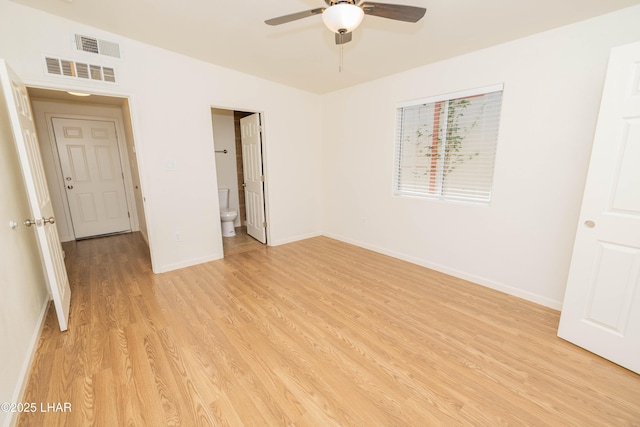 31447 Marine Dr, Parker, AZ 85344 - unfurnished room featuring light wood-style flooring, visible vents, ceiling fan, and baseboards
