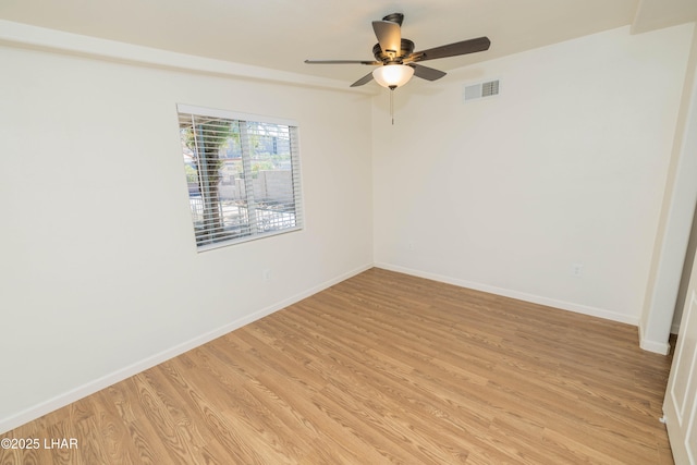 31447 Marine Dr, Parker, AZ 85344 - empty room featuring visible vents, ceiling fan, light wood-type flooring, and baseboards