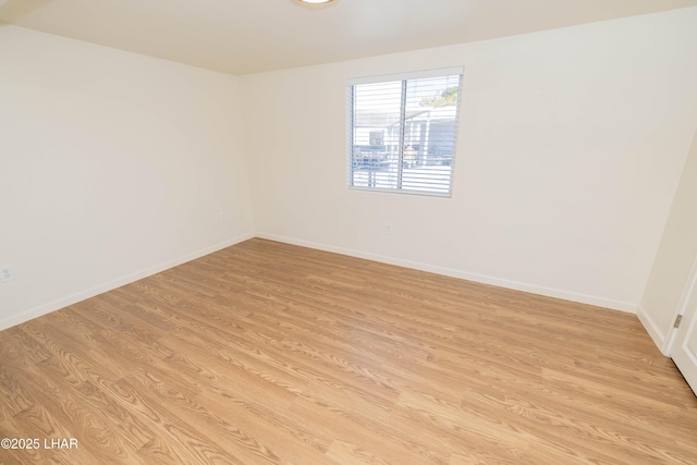 31447 Marine Dr, Parker, AZ 85344 - spare room featuring light wood-style flooring and baseboards