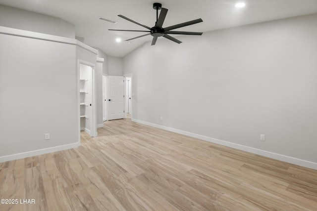 unfurnished bedroom featuring light wood finished floors, lofted ceiling, recessed lighting, visible vents, and baseboards