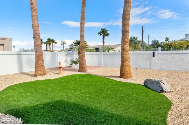 view of yard featuring a fenced backyard