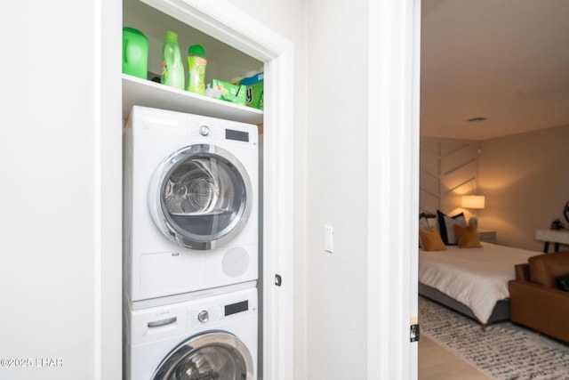 8625 Riverside Dr Unit 55, Parker, AZ 85344 - laundry room featuring stacked washer and clothes dryer