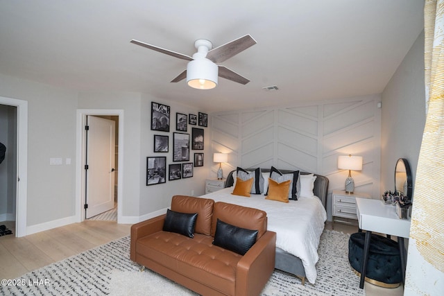 8625 Riverside Dr Unit 55, Parker, AZ 85344 - bedroom featuring wood-type flooring and ceiling fan