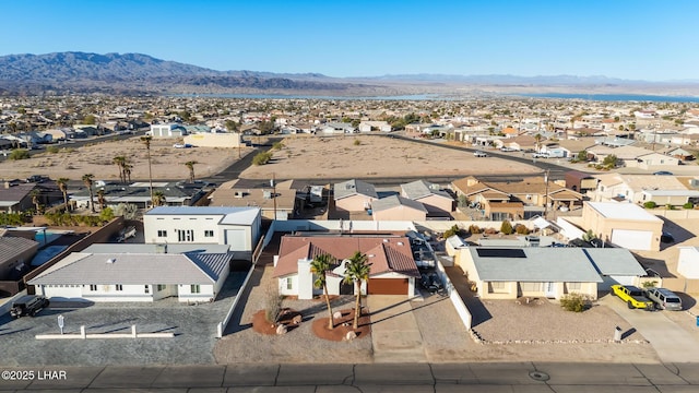 birds eye view of property featuring a residential view and a mountain view