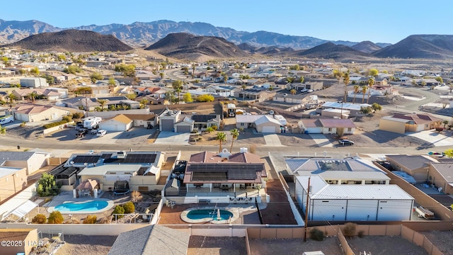 birds eye view of property with a residential view and a mountain view