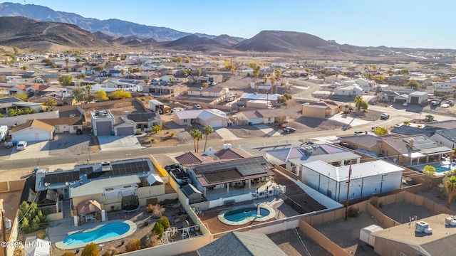 birds eye view of property featuring a mountain view and a residential view