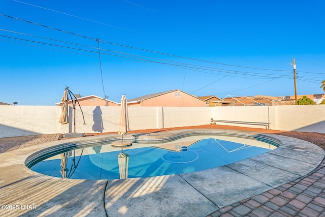 view of pool with a patio area, a fenced backyard, and a fenced in pool