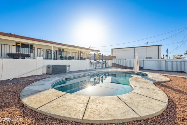 view of pool with a patio area, a fenced in pool, and a fenced backyard