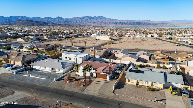 aerial view with a mountain view and a residential view