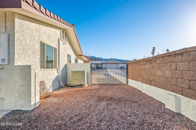 view of yard with a gate and fence