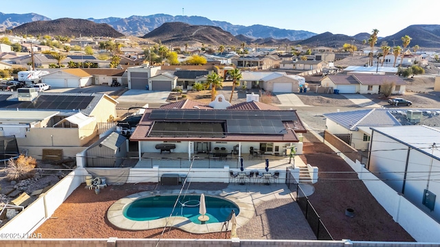 bird's eye view featuring a residential view and a mountain view