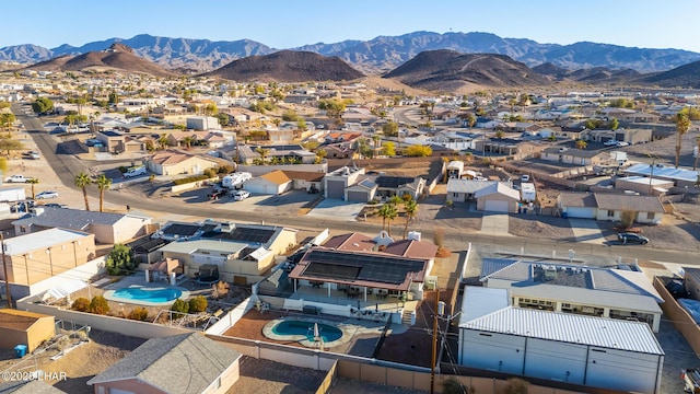 birds eye view of property with a residential view and a mountain view