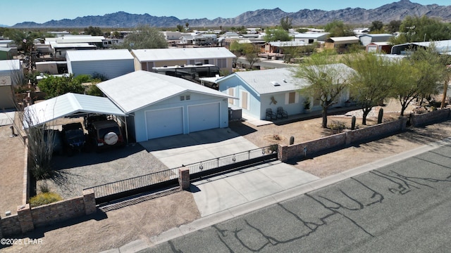 bird's eye view with a residential view and a mountain view