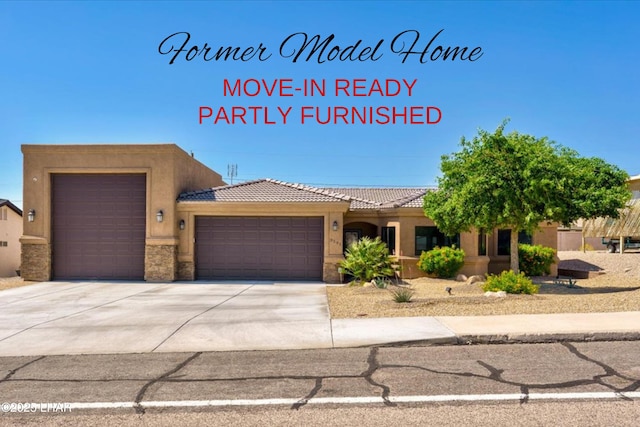 view of front of property featuring a garage