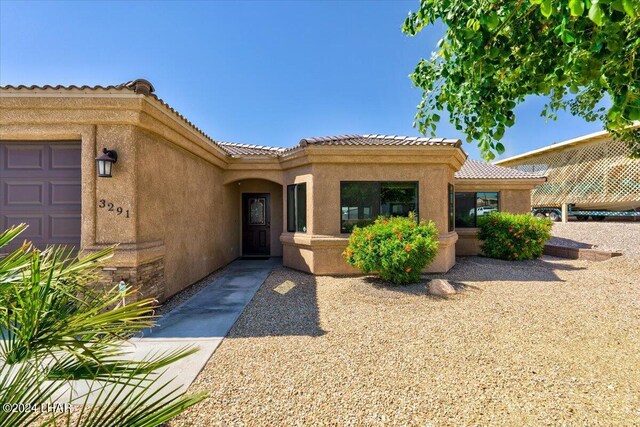 view of front of home with a garage