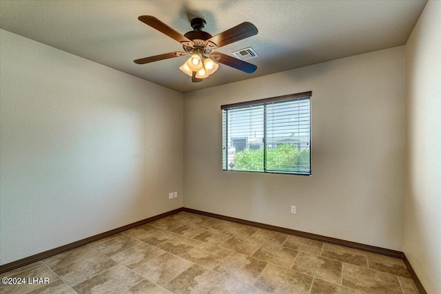 empty room with ceiling fan