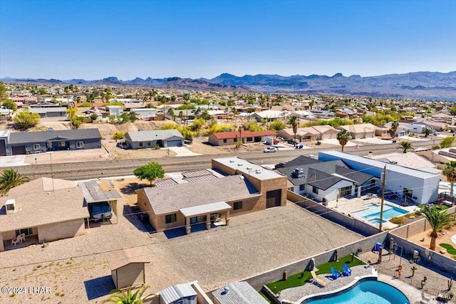 bird's eye view with a mountain view