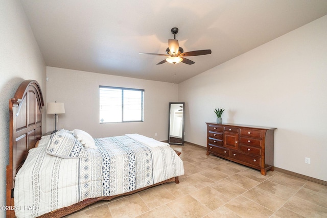 bedroom featuring ceiling fan and lofted ceiling