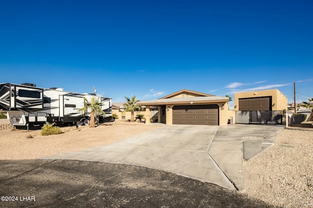 view of front of property with a garage