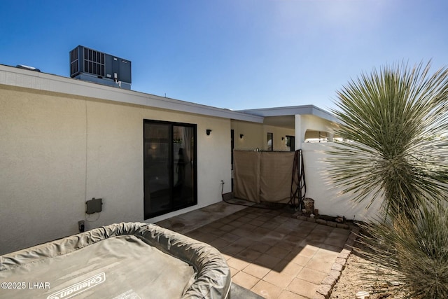 view of patio with central AC unit