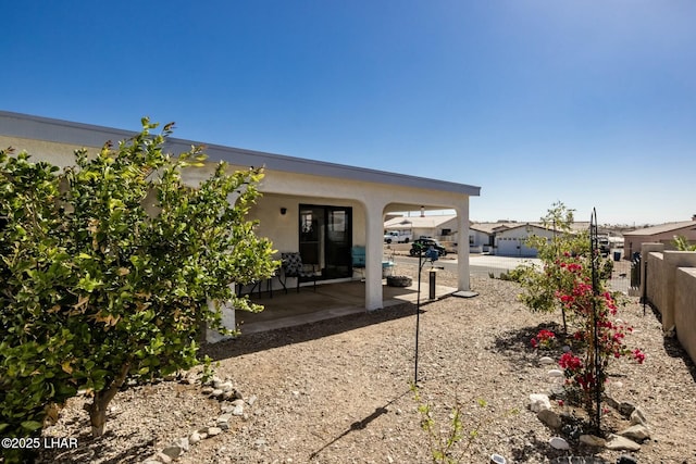 view of yard featuring a patio area and fence