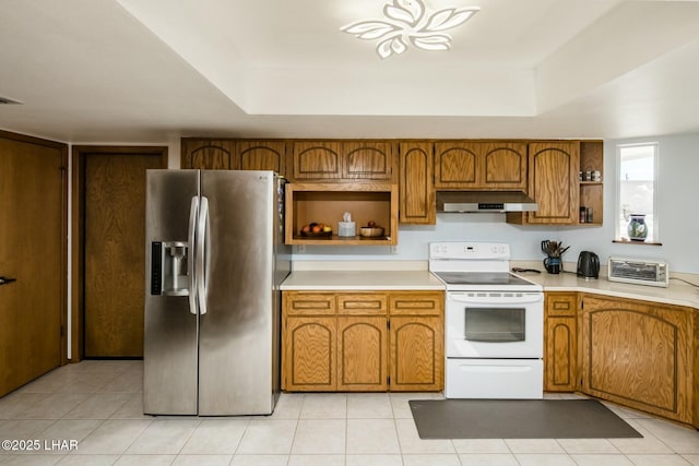 kitchen featuring stainless steel fridge, under cabinet range hood, white range with electric cooktop, and open shelves