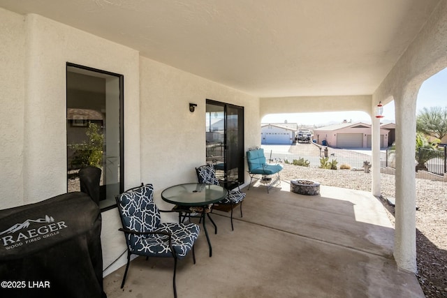 view of patio / terrace with fence