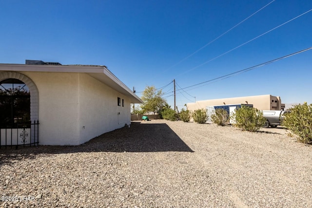 exterior space with stucco siding