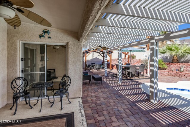 view of patio / terrace featuring a pergola and ceiling fan