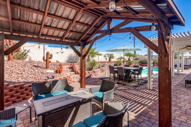 view of patio featuring a fenced in pool, a gazebo, an outdoor living space, and a pergola