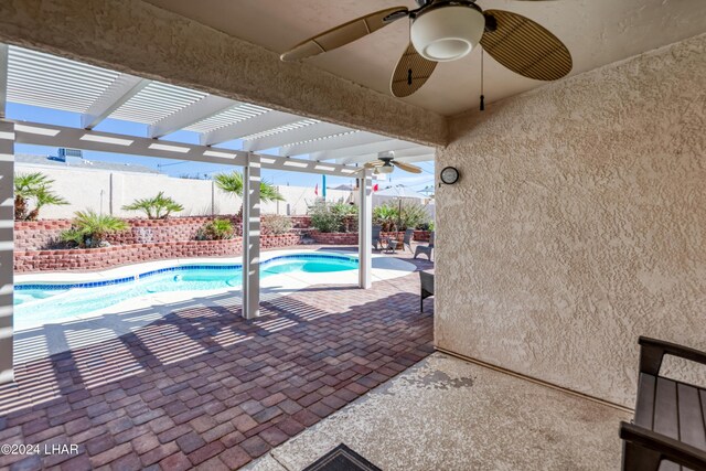 view of pool featuring a patio, ceiling fan, and a pergola