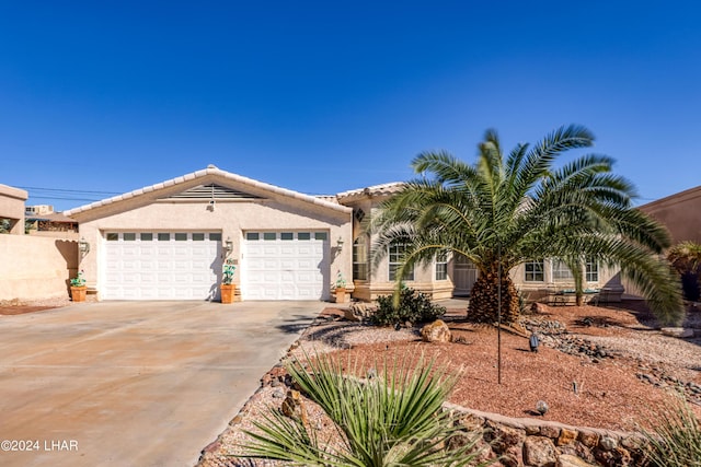 view of front of home with a garage