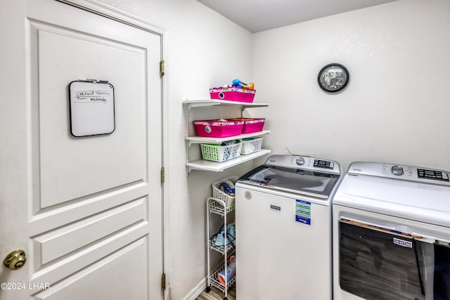 laundry room featuring independent washer and dryer