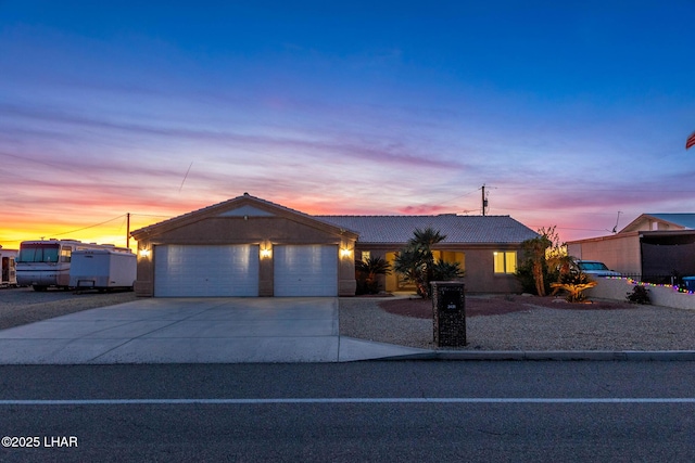 ranch-style home with a garage