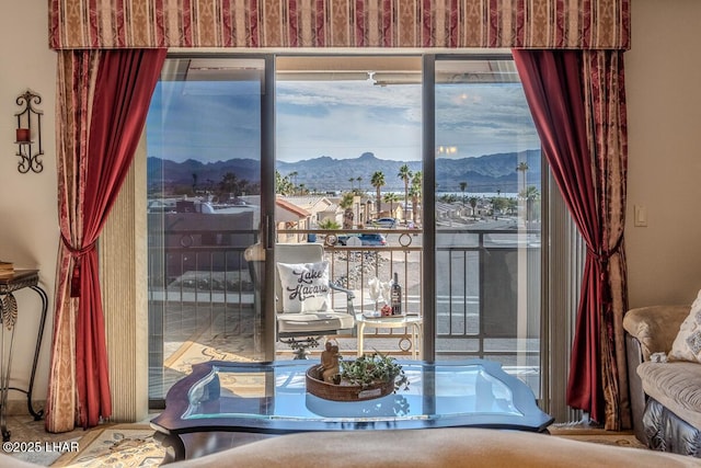 doorway to outside with a mountain view