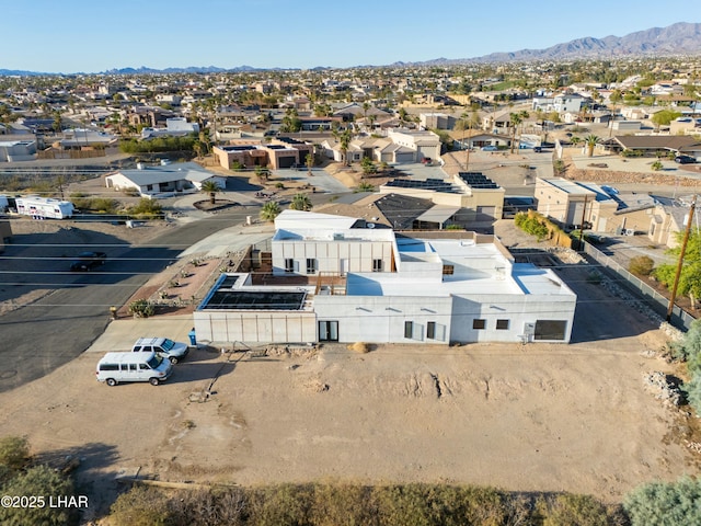 drone / aerial view with a mountain view and a residential view