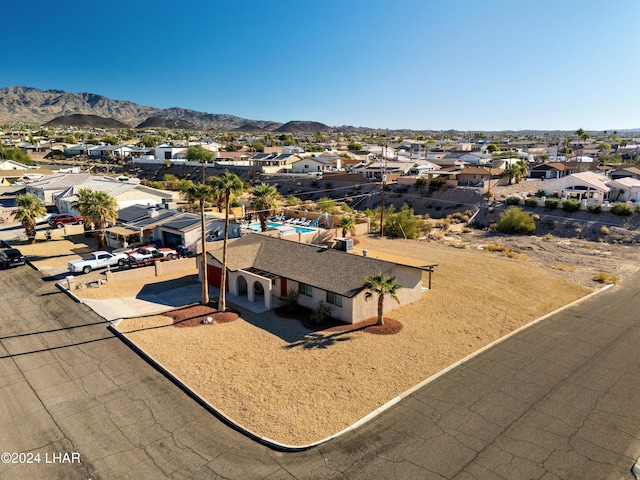 birds eye view of property featuring a mountain view