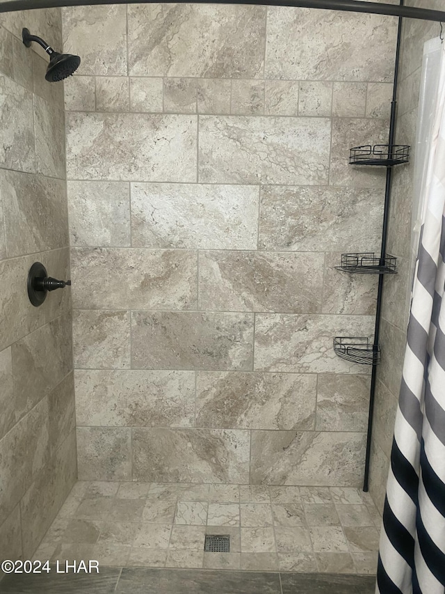 bathroom with a shower with curtain