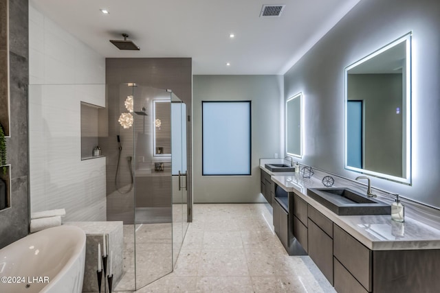 bathroom with vanity and plus walk in shower