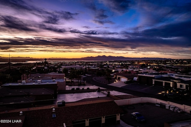 aerial view at dusk with a mountain view