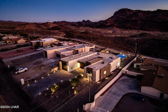 aerial view at dusk with a mountain view