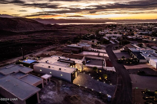 aerial view at dusk with a mountain view