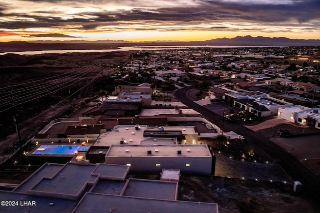 aerial view at dusk with a mountain view