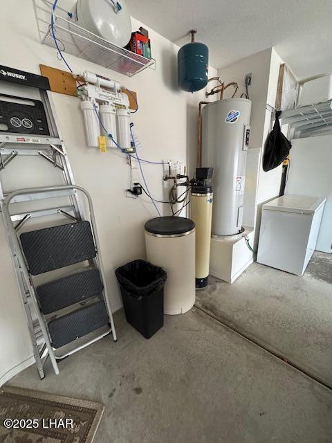 utility room featuring electric water heater