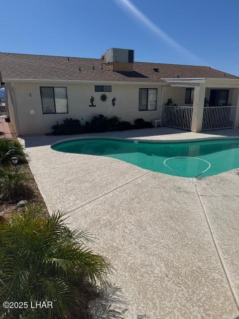 pool featuring a patio area